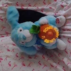 Brand new Peter cottontail bunny in blue singing here comes Peter cottontail